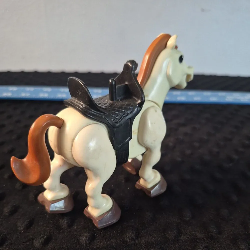 1979 vintage FISHER PRICE Husky Helper rodeo white and tan horse with saddle